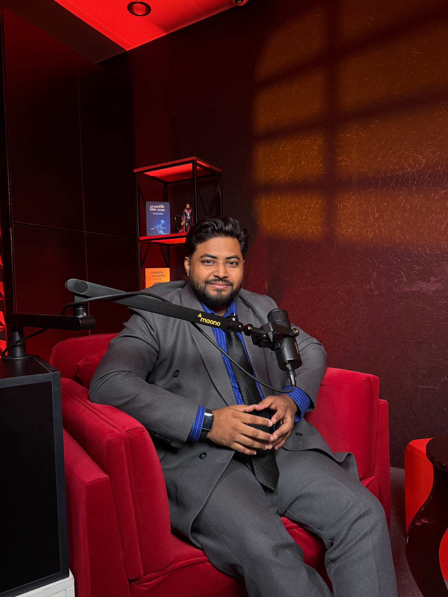 MHR Chowdhury in a podcast studio, engaged in conversation